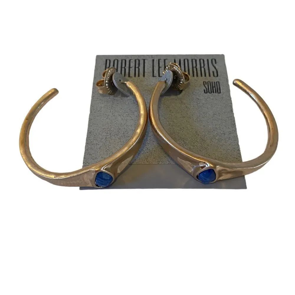 Robert Lee Morris Hammered Gold Toned Hoops w/ Royal Blue Faceted Stone.